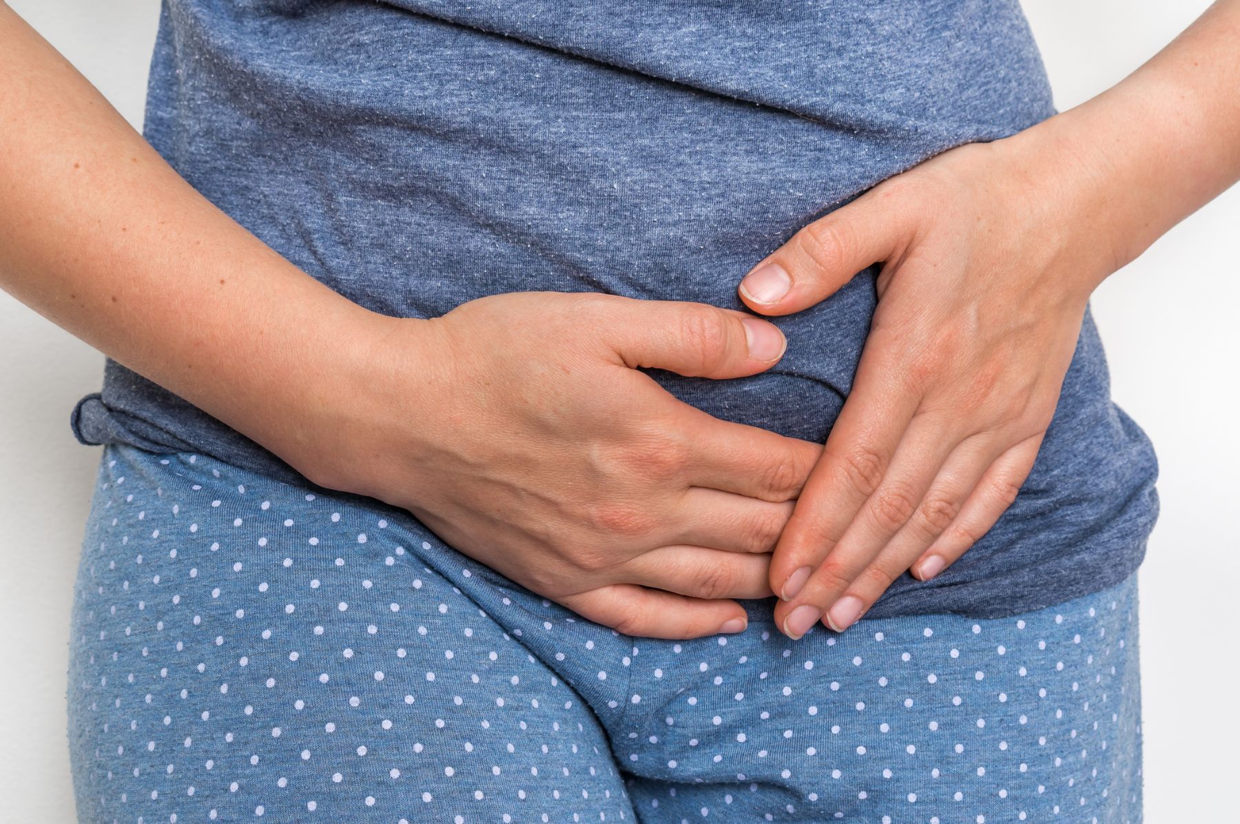 Woman experiencing Mirena IUD side effects